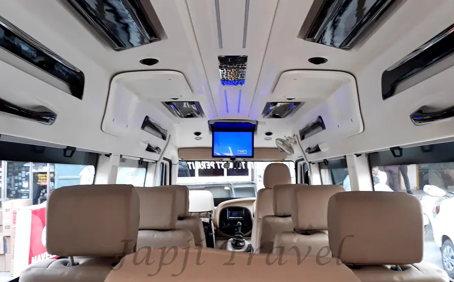 Captain seats inside a premium tempo traveller